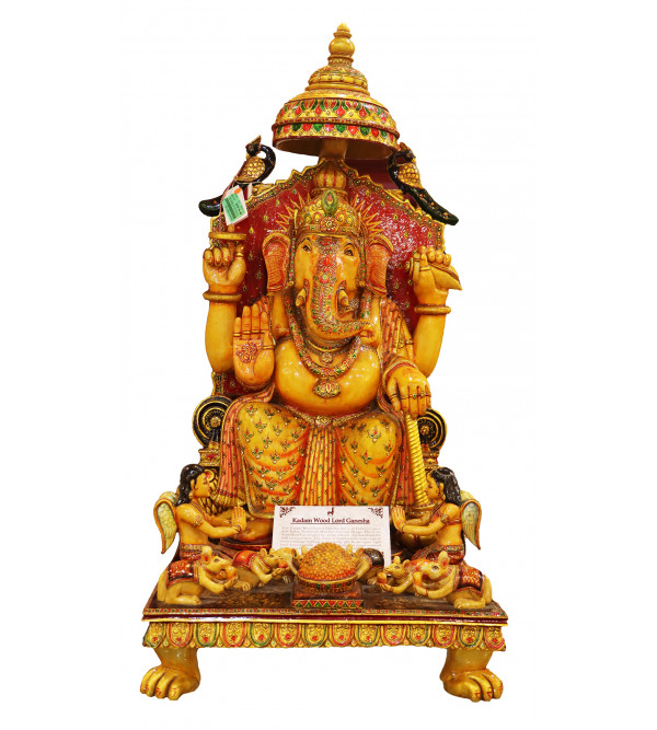 Lord Ganesha With Jewellery In Kadam Wood ( Note:- Packing & Shipping Charges will be Extra as per actual.)