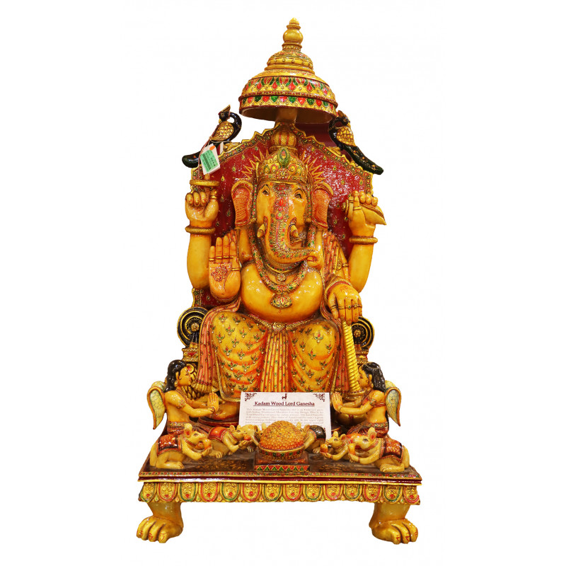 Lord Ganesha With Jewellery In Kadam Wood ( Note:- Packing & Shipping Charges will be Extra as per actual.)